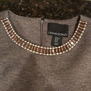 Jeweled collar stretch knit sleeveless blouse